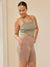 Side view of taupe Cargo 7-inch anti-chafe shorts on model showing cargo pocket and mid-thigh fit on neutral background