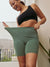 Front view of The Cargo 7-inch sage slip shorts on model showcasing high-rise stretchy waistband and cargo pocket