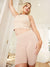 Low front view of The Original slip shorts in Almond on model showing high waist and 7 inch inseam mid-thigh seamless fit